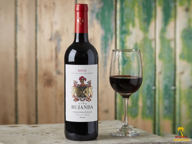 Egy pohár Rioja és a borosüveg